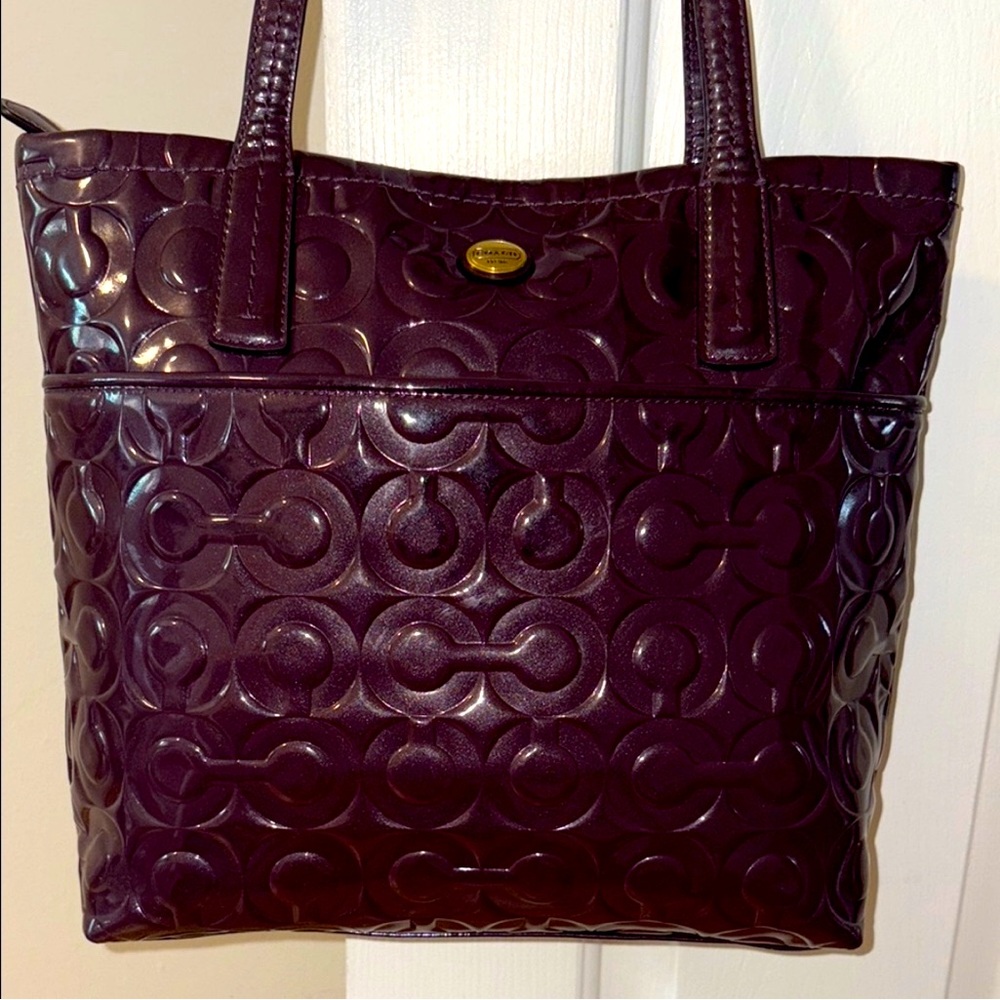 Coach Peyton Embossed Signature C Patent Leather Tote In Plum. No call outs.